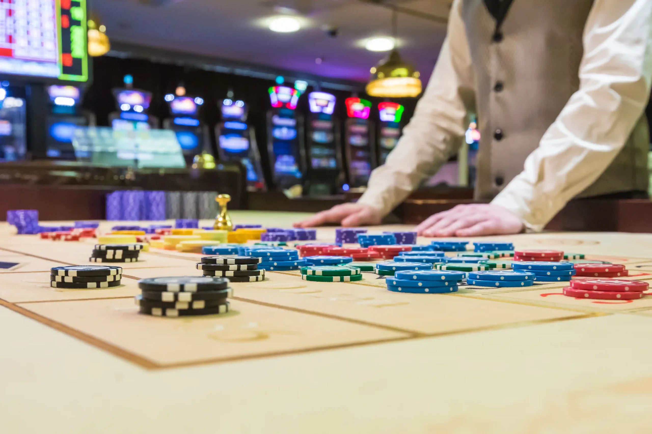 casino-dealer-at-table-with-chips-2026-03-19-23-09-34-utc