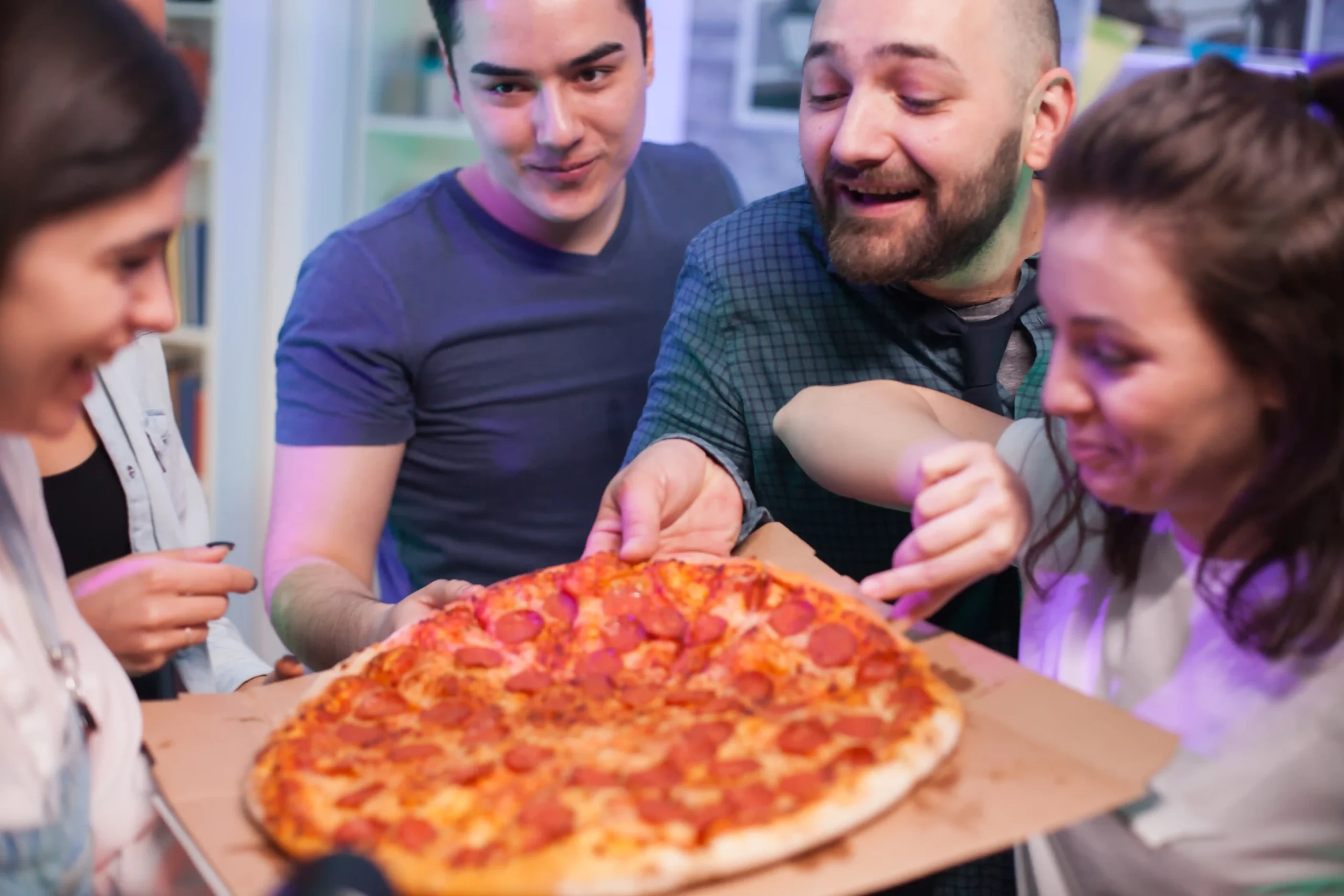 close-up-friends-at-a-party-excited-about-deliciou-2026-03-19-01-53-45-utc