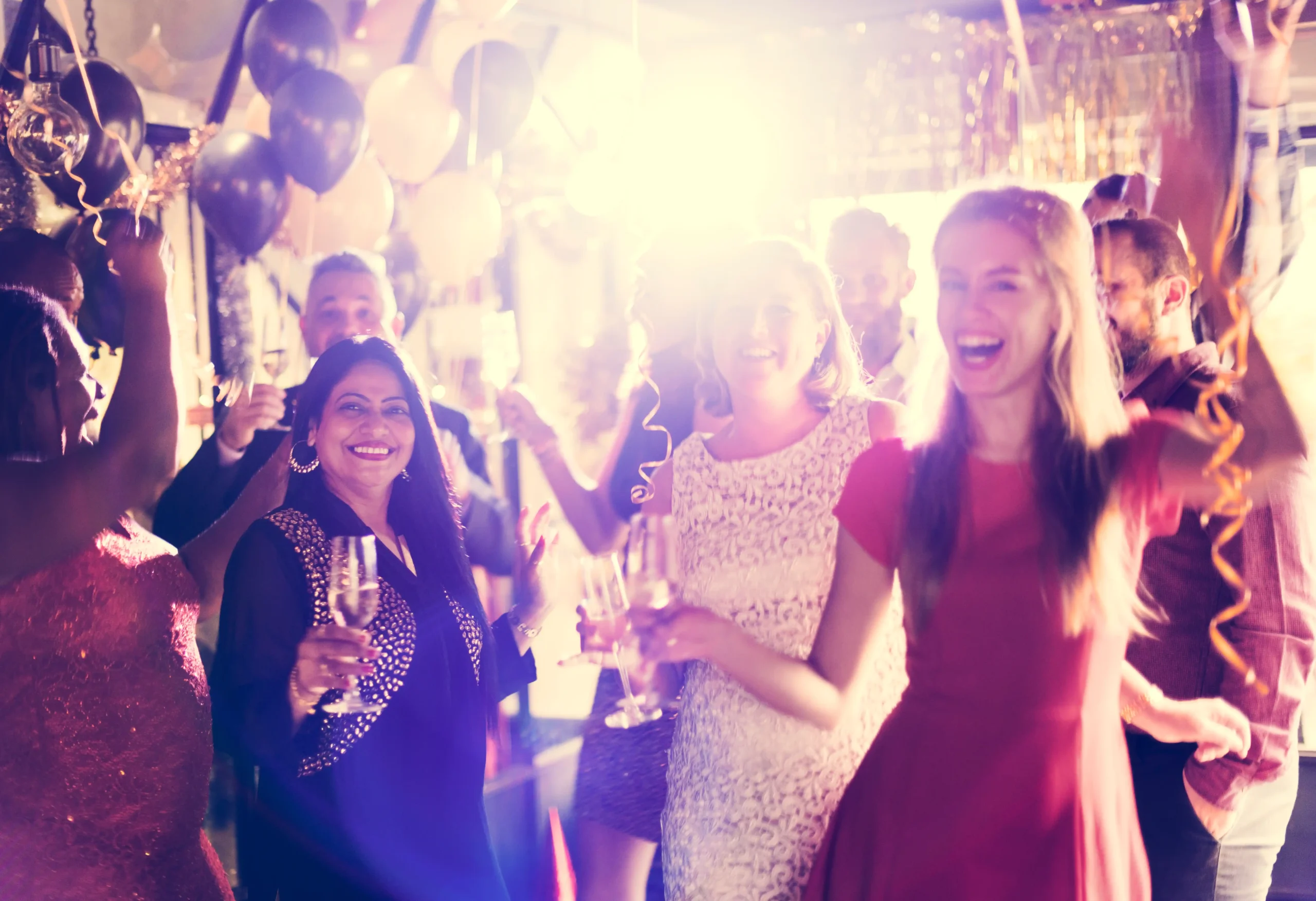festive-celebration-with-smiling-adults-and-balloo-2026-03-18-12-02-05-utc