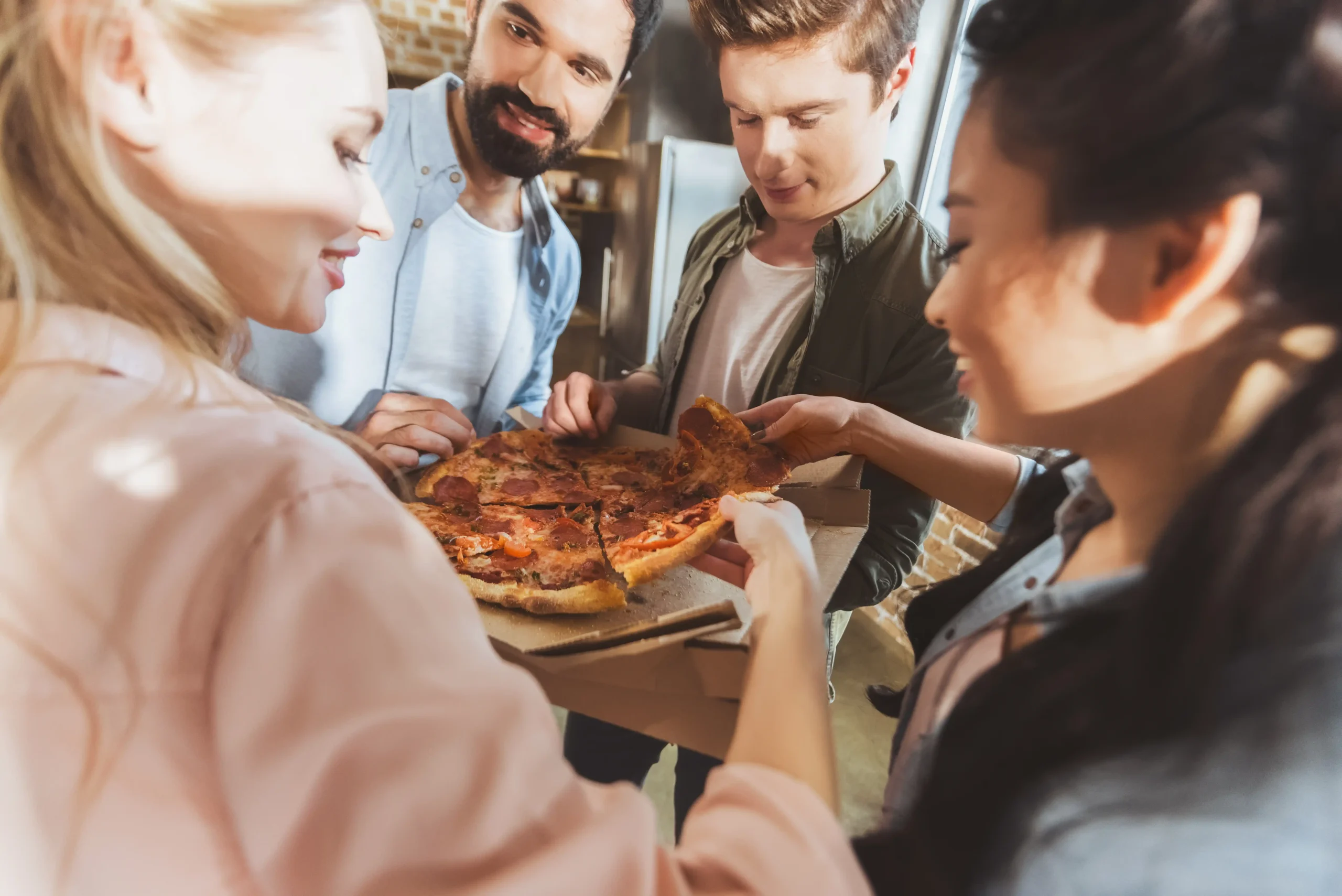 friends-sharing-pizza-together-inside-2026-01-06-00-43-55-utc
