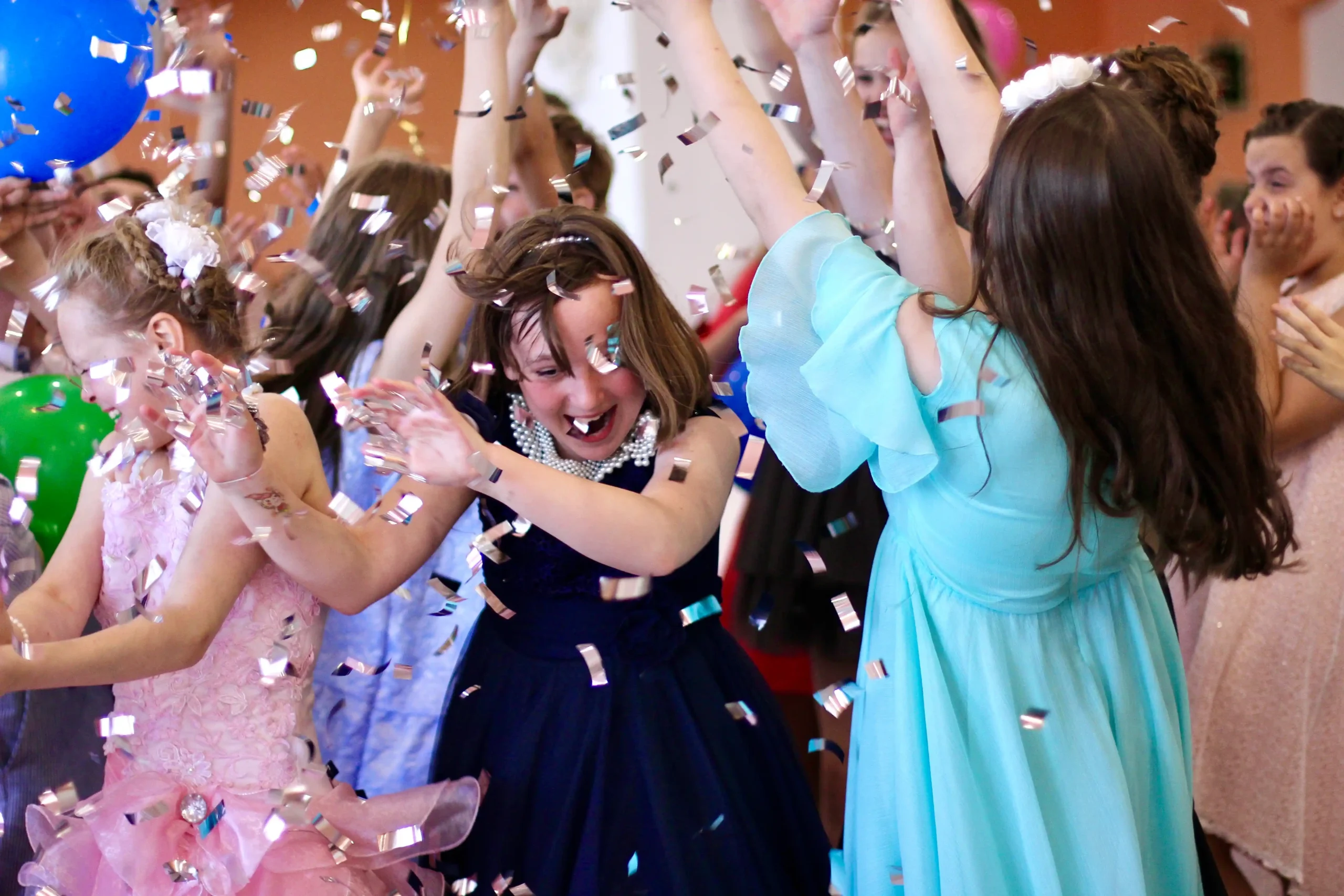 teenagers-celebrate-with-confetti-and-balloons-at-2026-03-13-04-23-23-utc